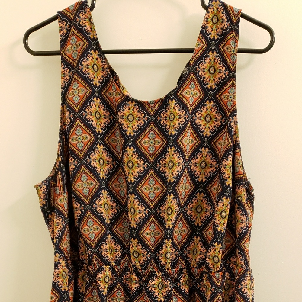 silky dress with open back and gold buttons